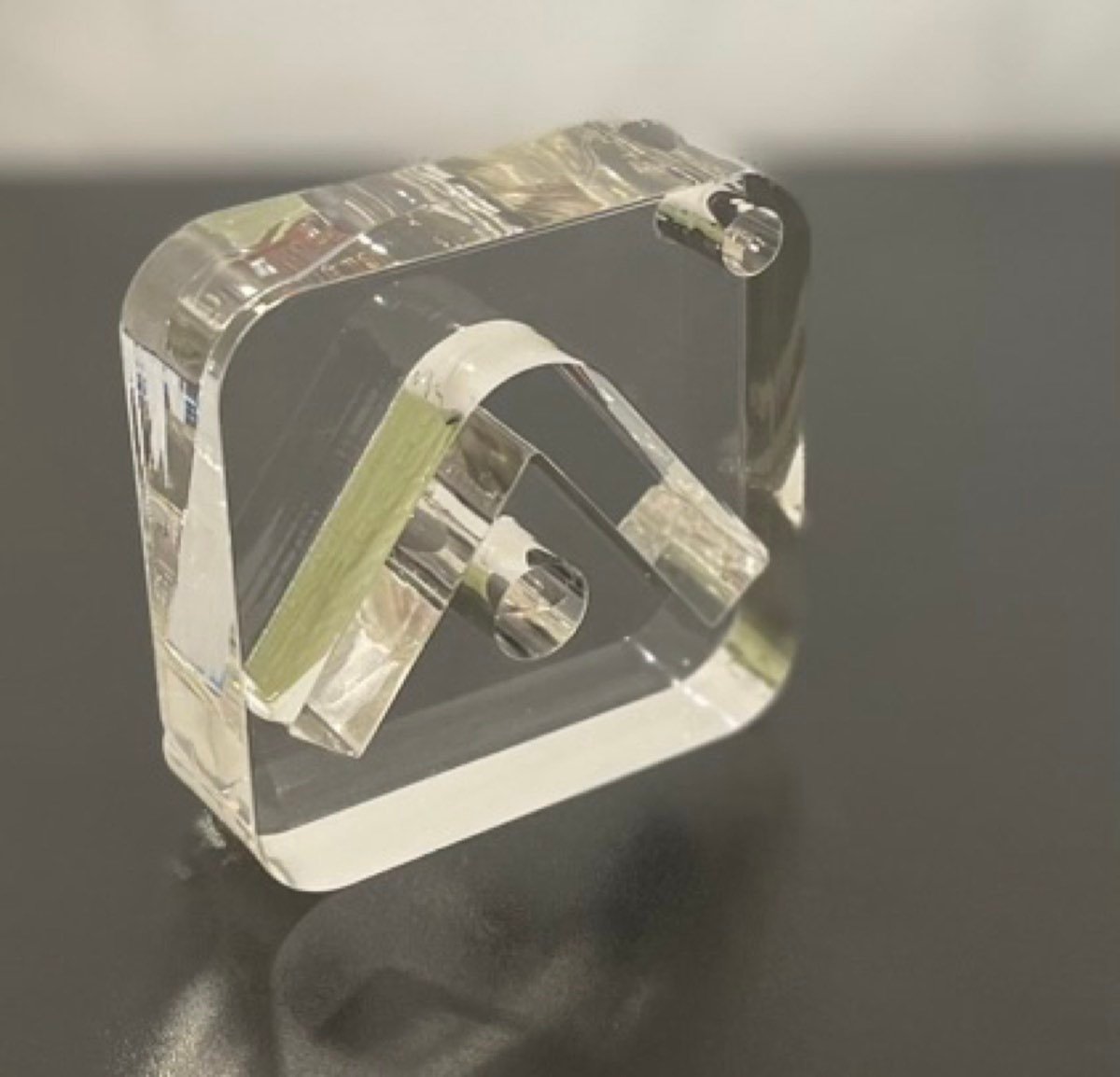 Clear acrylic ACP logo with polished edges, waterjet cut with no heat or melting