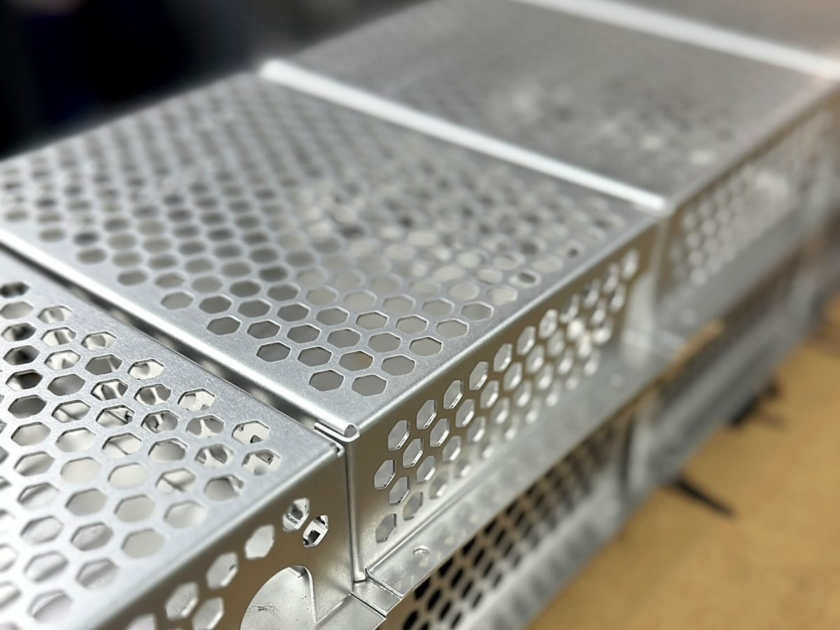 Formed aluminum enclosure with perforated panels made at ACP Waterjet