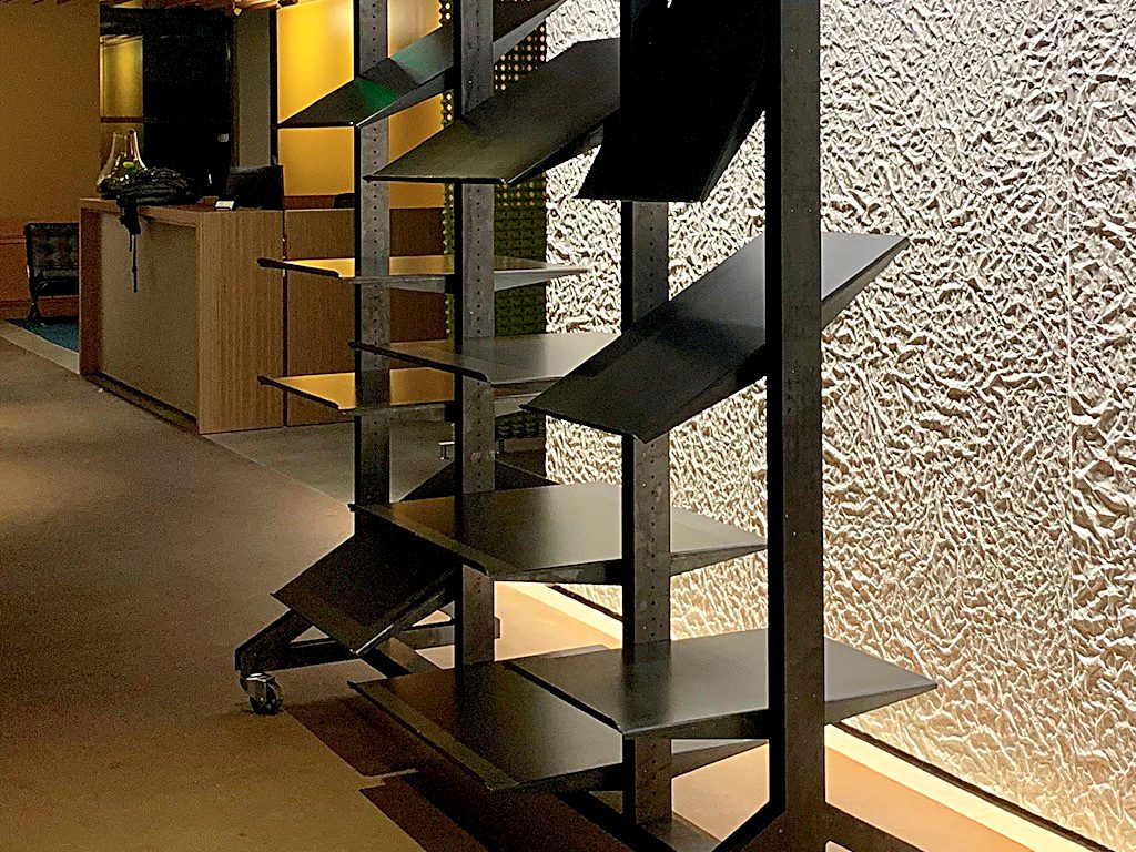 Black laser cut and bent metal shelves made at ACP Waterjet