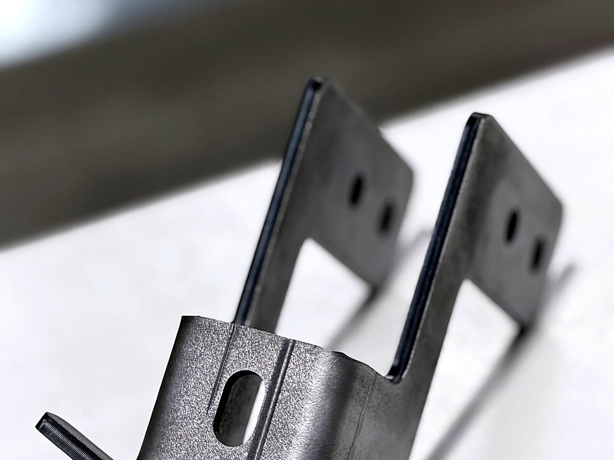 Formed steel bracket with multiple press brake bends made at ACP Waterjet