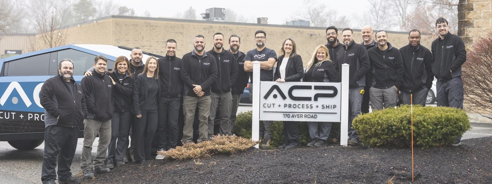 The ACP Waterjet team outside the shop at 170 Ayer Road in Littleton, Massachusetts