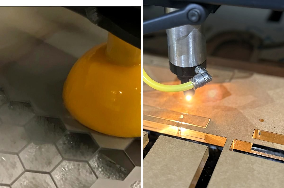 Waterjet nozzle and laser cutting head side by side at ACP Waterjet